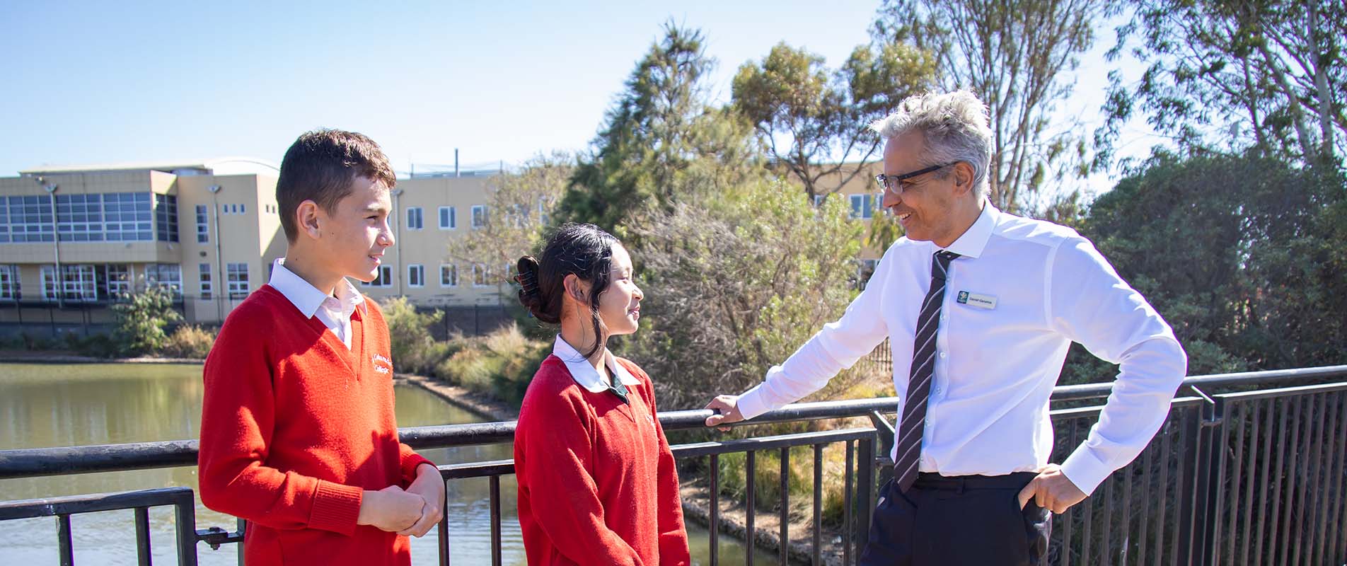 Daniel Ganama with students.jpg