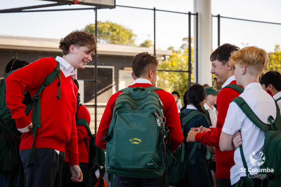 Students greet each other on the first day
